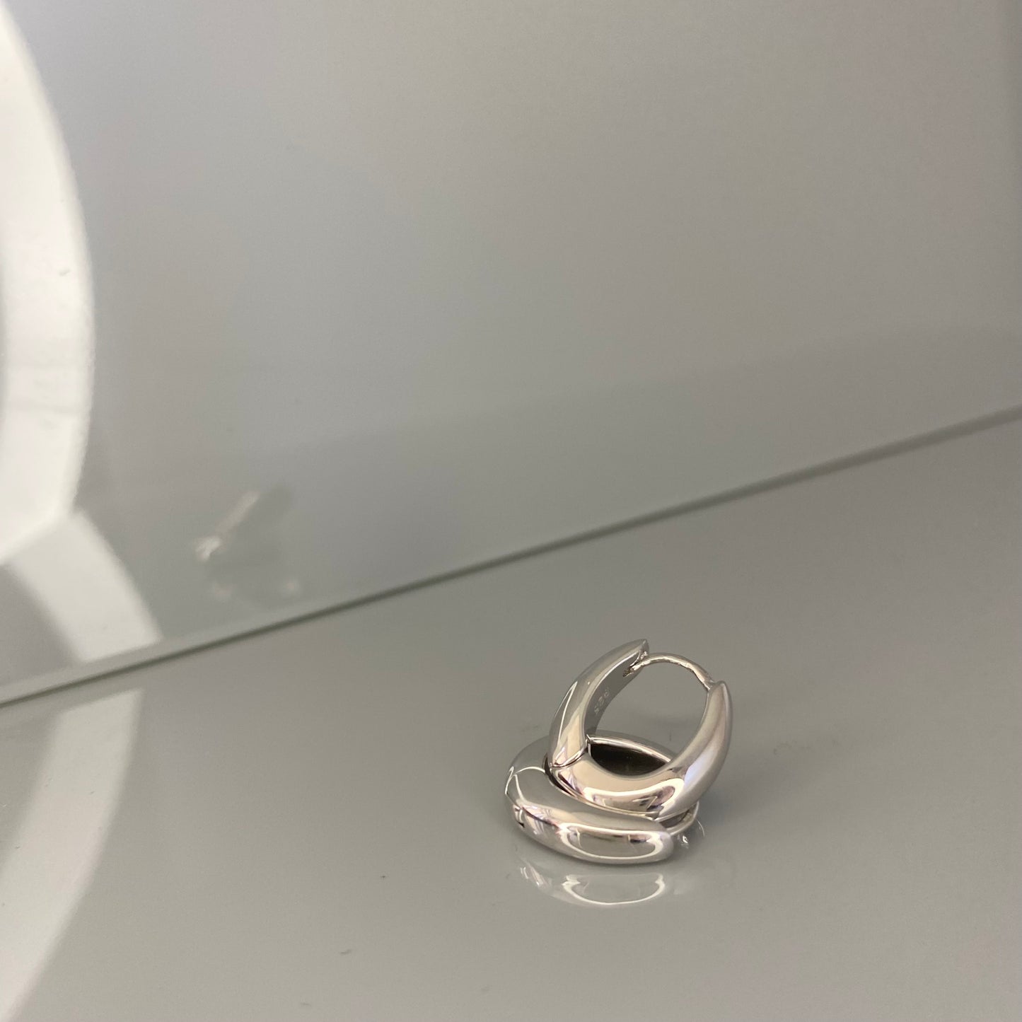Aros ovalados de plata de ley