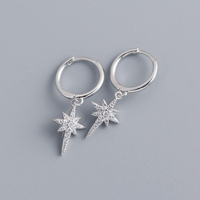 Aros con dije de estrella de plata de ley